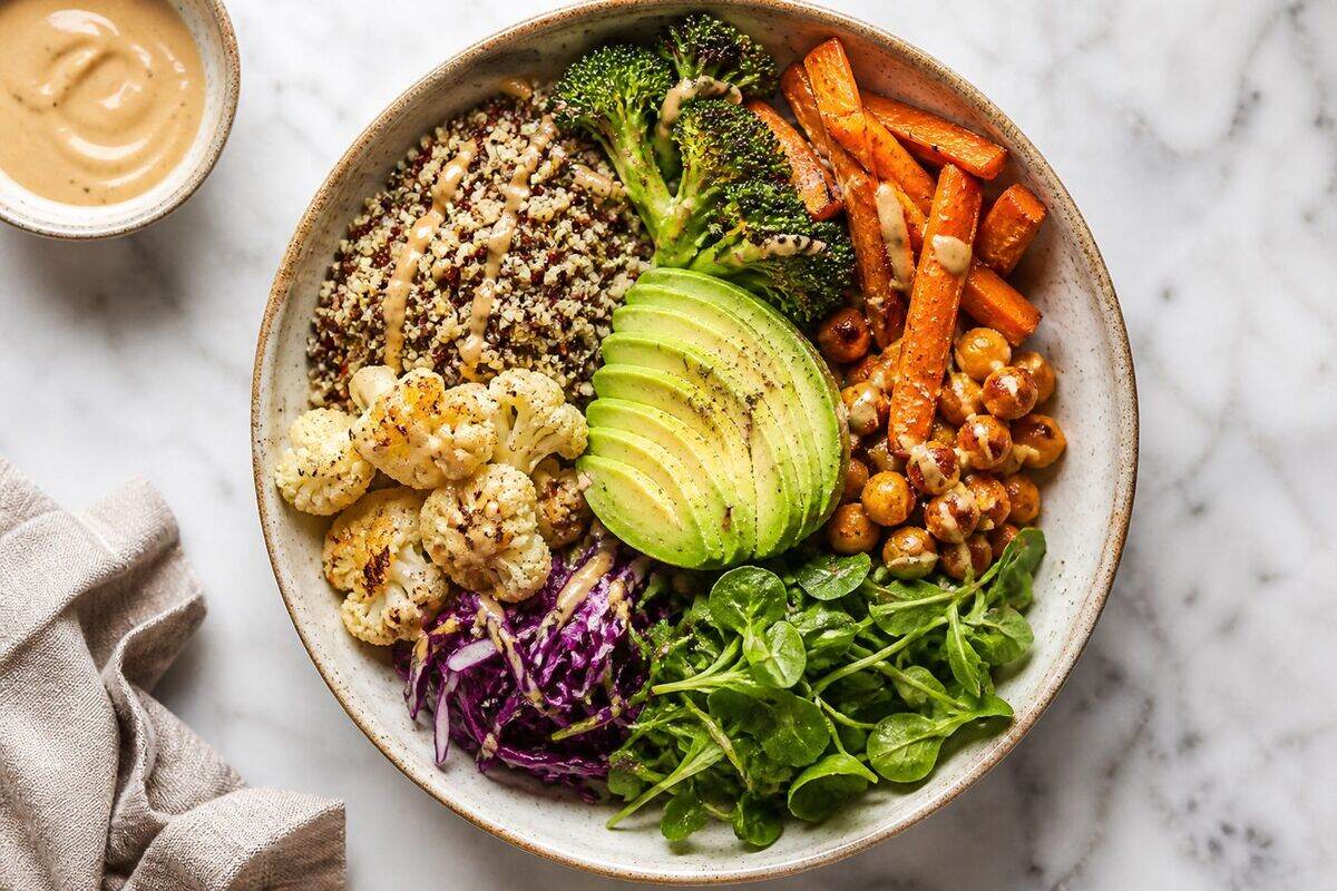 Overhead grain bowl representing the warm Kyura kitchen